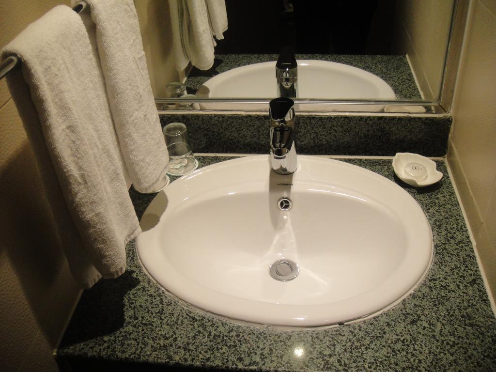 New Gloria Plaza Garden Hotel Harbin Quarto foto