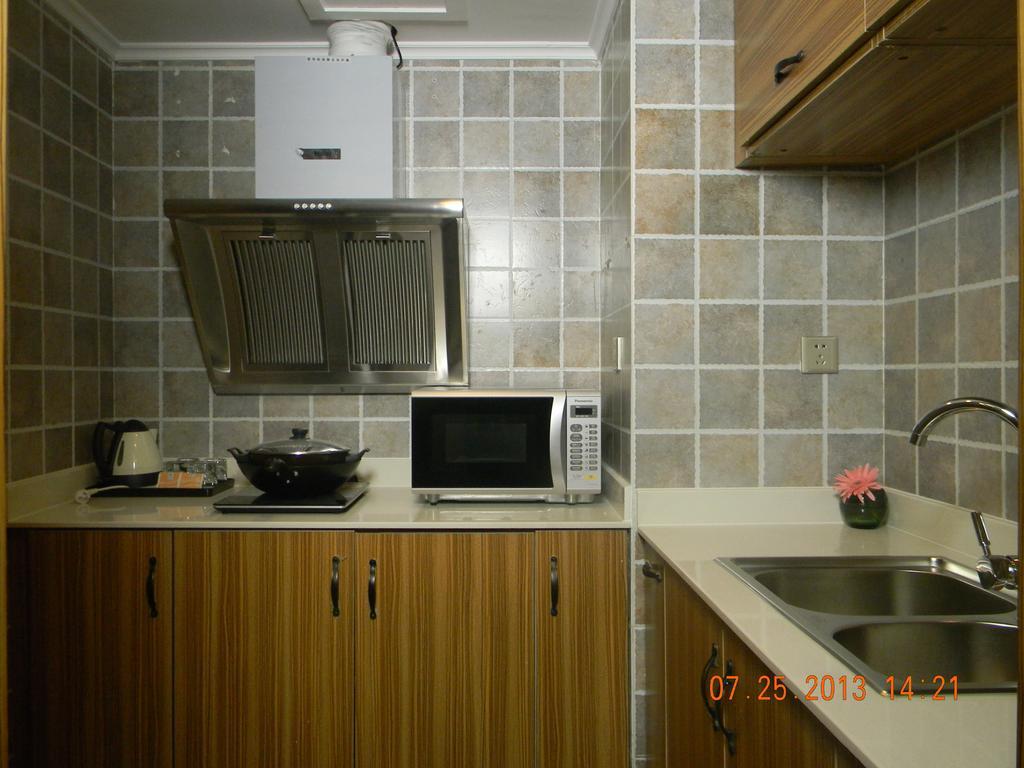 New Gloria Plaza Garden Hotel Harbin Quarto foto