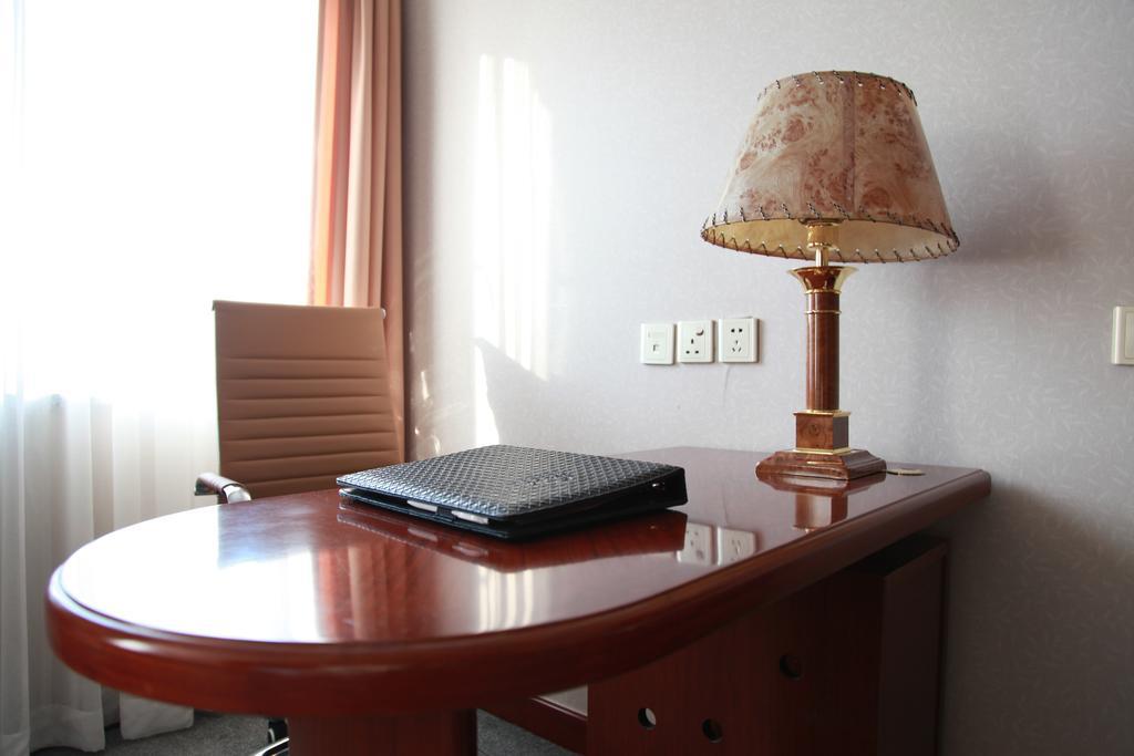 New Gloria Plaza Garden Hotel Harbin Quarto foto