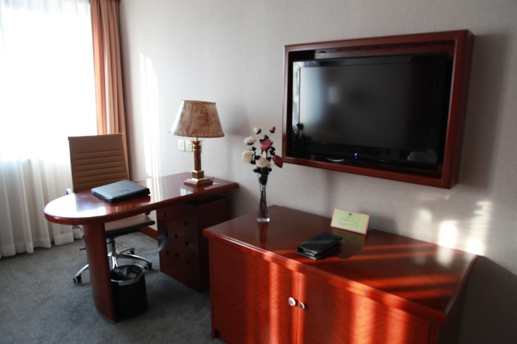 New Gloria Plaza Garden Hotel Harbin Quarto foto