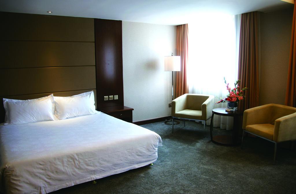 New Gloria Plaza Garden Hotel Harbin Exterior foto