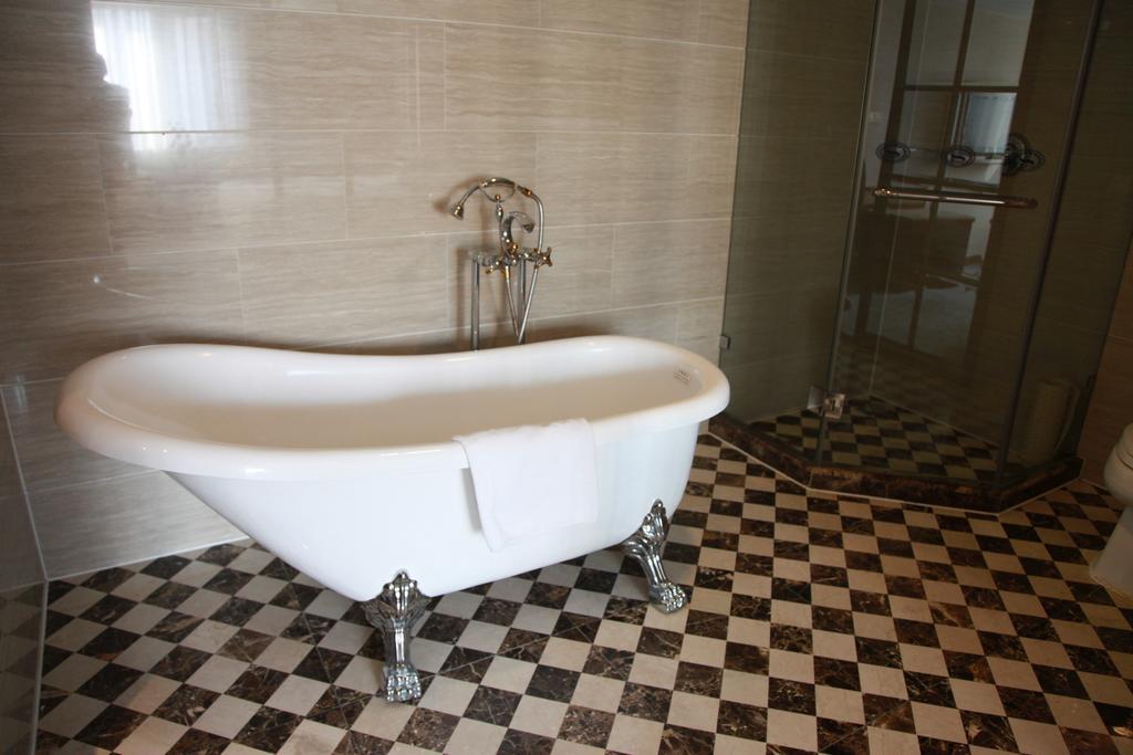 New Gloria Plaza Garden Hotel Harbin Quarto foto
