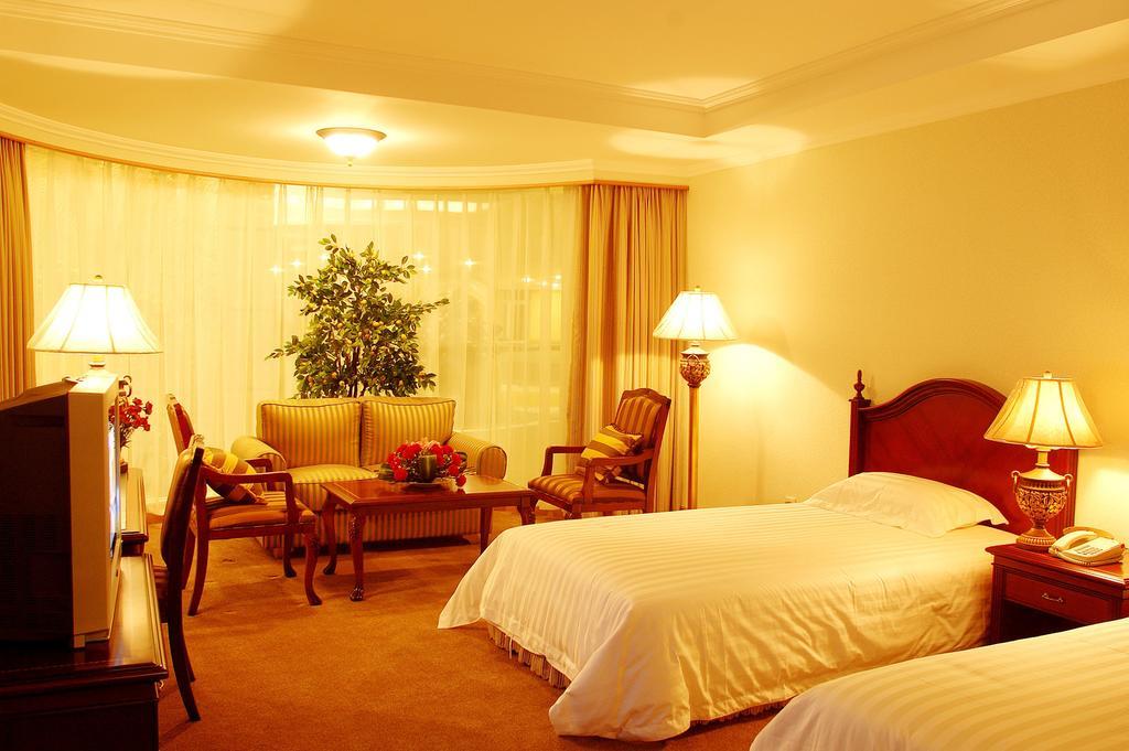 New Gloria Plaza Garden Hotel Harbin Quarto foto